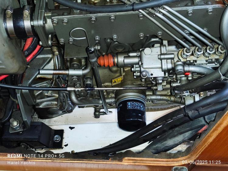 Engine compartment of a 2005 Beneteau Cyclades 43.3 yacht, showcasing mechanical components.