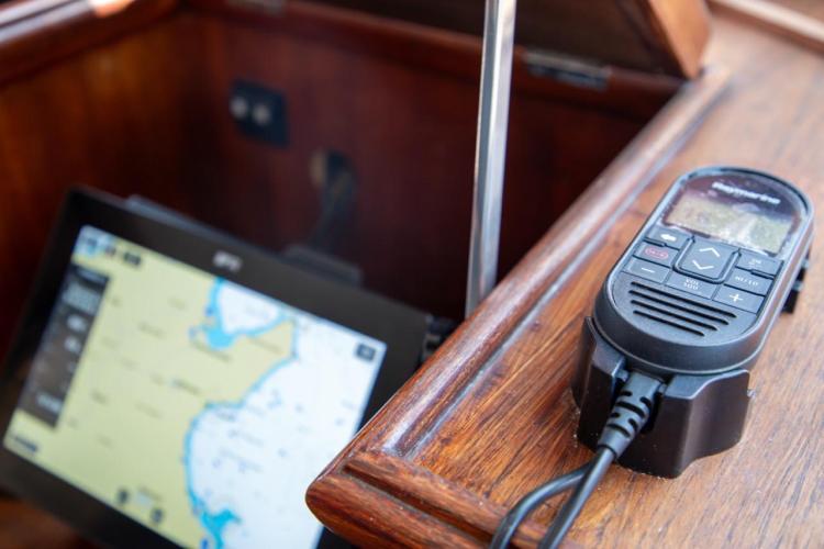 Navigation equipment on a 1972 Benetti 33 yacht, featuring a GPS and communication device.