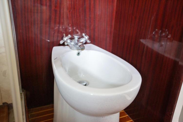 Bidet with vintage faucet on Benetti 33 yacht, 1972 model.