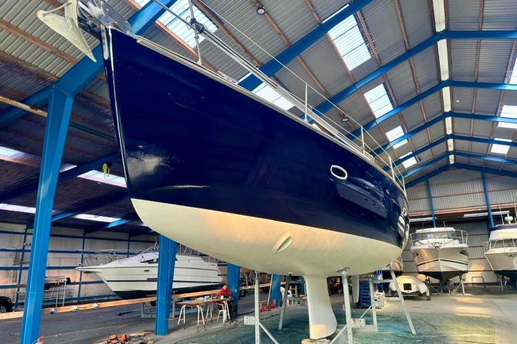 Bavaria Cruiser 46 sailboat, 2006 model, in a boatyard for maintenance.