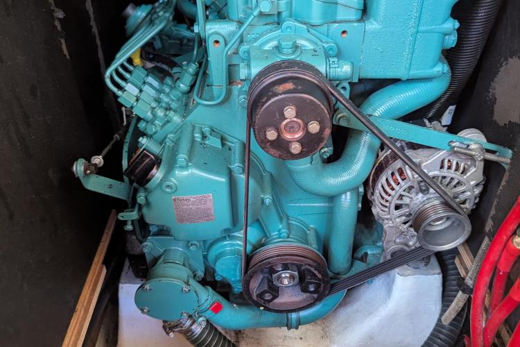 Engine of 2017 Dufour 460 Grand Large sailboat, showcasing belts and components.