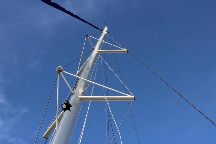 Mast of 2017 Fountaine Pajot SABA 50 catamaran against clear blue sky.