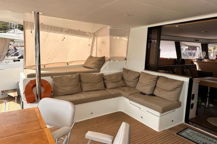 Luxurious 2016 Fountaine Pajot Ipanema 58 yacht interior with cozy seating area.