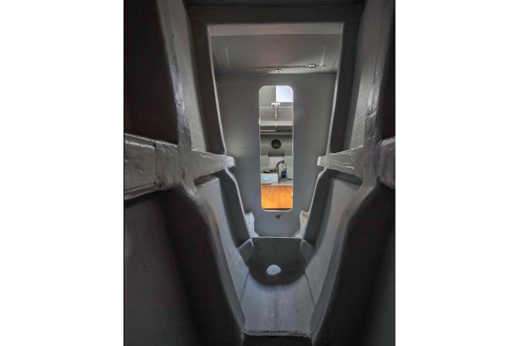 Interior view of 2026 Custom DAYCHARTER boat, showcasing sleek, modern design and craftsmanship.