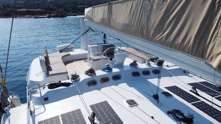 2019 Squalt Marine CK 64 yacht with solar panels, anchored in serene waters.