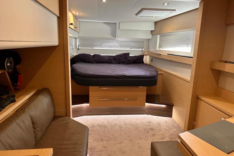 Luxurious cabin interior of 2016 Fountaine Pajot Ipanema 58 catamaran with modern furnishings.