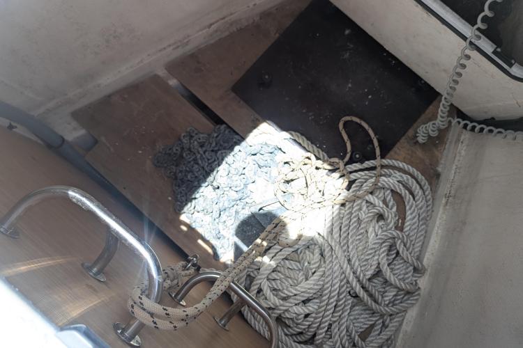 Anchor chain and ropes on a 2017 Dufour 460 Grand Large sailboat deck.