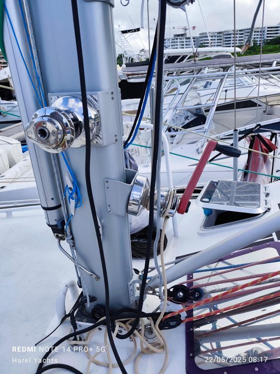 Close-up of a 2019 Custom Patago 40 sailboat mast with rigging and winches.