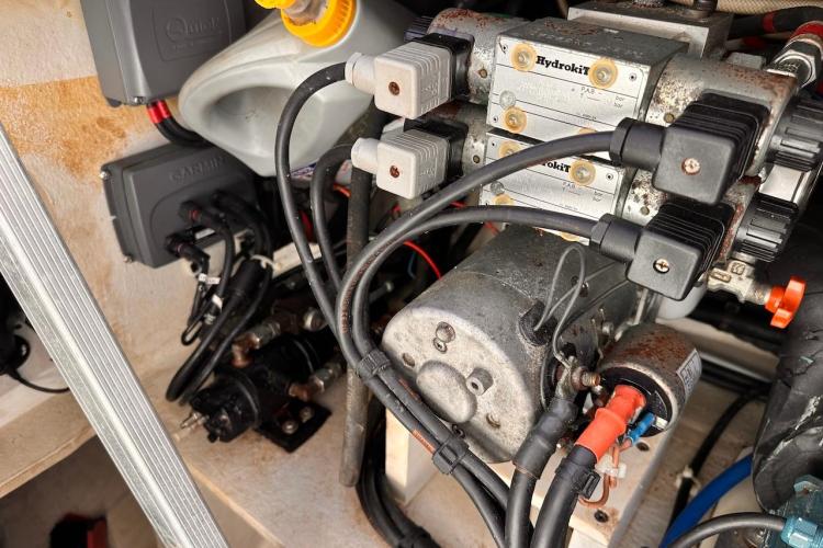 Engine compartment of 2016 Fountaine Pajot Ipanema 58 with hydraulic and electrical components.