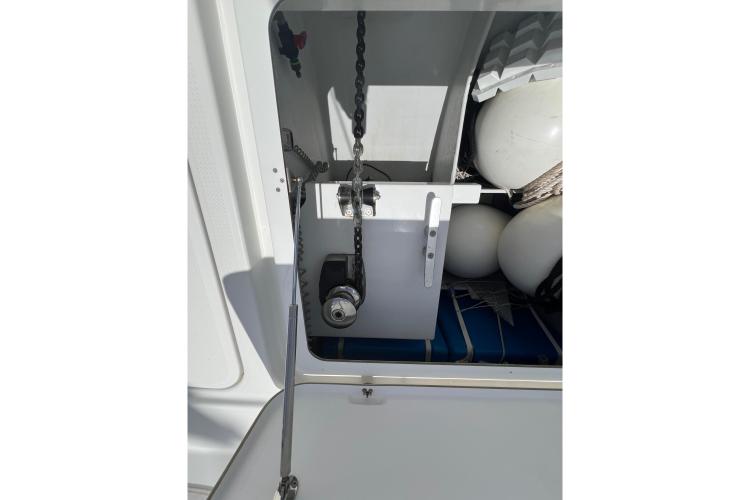 Anchor chain compartment of 2023 Fountaine Pajot Astrea 42 Catamaran with fenders.