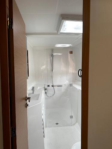2024 Excess 11 yacht bathroom with modern shower and sleek design.