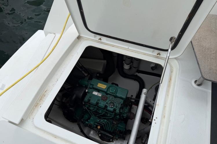Engine compartment of a 2020 Fountaine Pajot Astrea 42 catamaran, showcasing marine engine details.