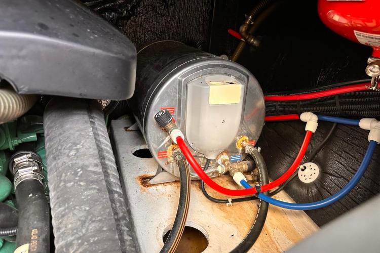 Engine compartment of 2016 Fountaine Pajot Ipanema 58 with visible wiring and components.