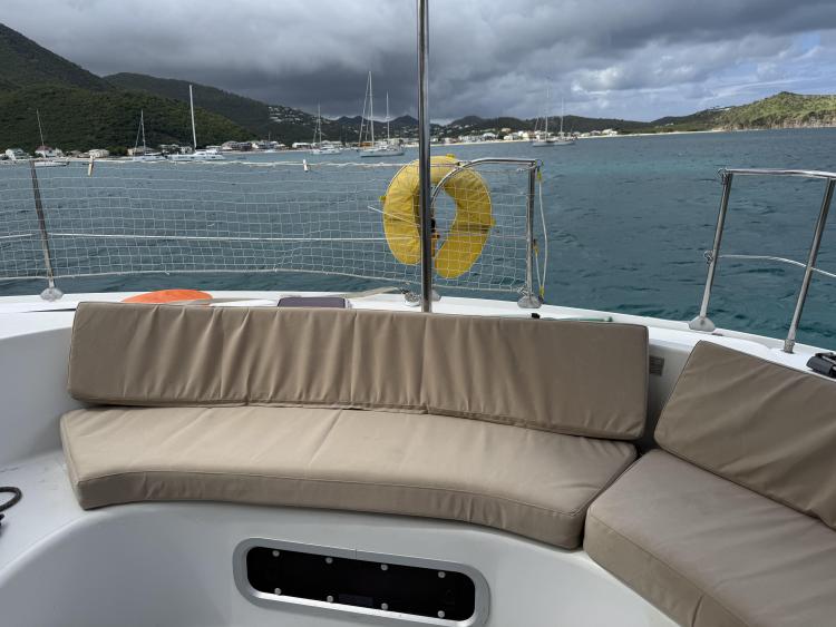 Fountaine Pajot Bahia 46 catamaran deck with seating, ocean view, and life preserver, 2006 model.