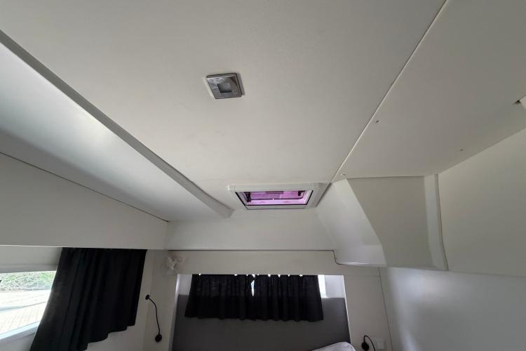 Interior view of 2020 Fountaine Pajot Astrea 42 catamaran cabin ceiling with window.