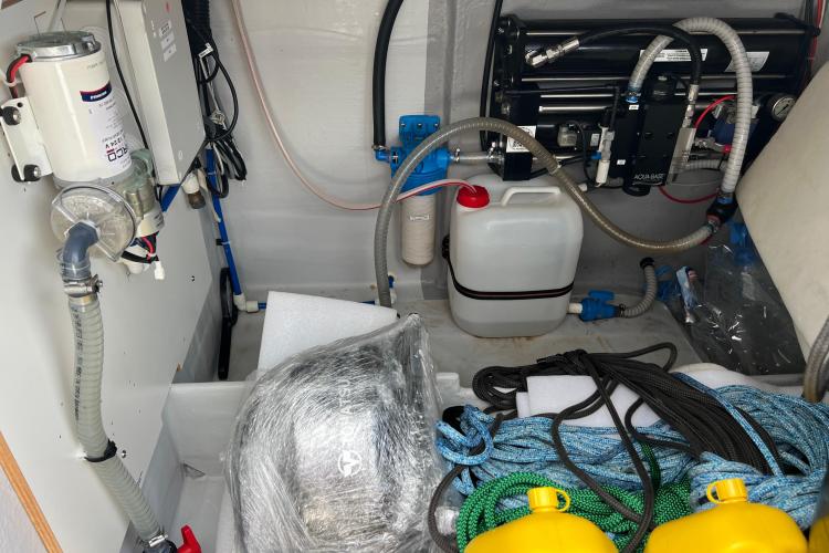 Engine room of 2023 Fountaine Pajot Astrea 42 Catamaran with equipment and ropes.