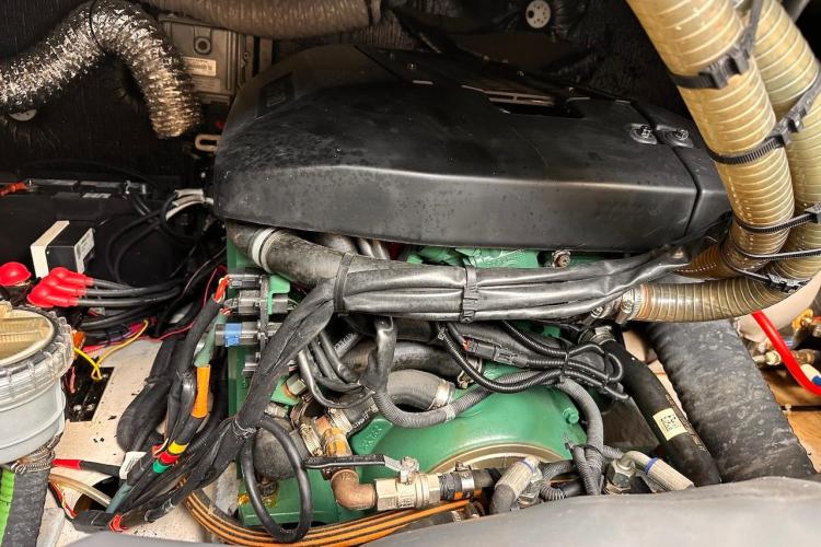 Engine compartment of a 2016 Fountaine Pajot Ipanema 58 catamaran, showcasing wiring and components.