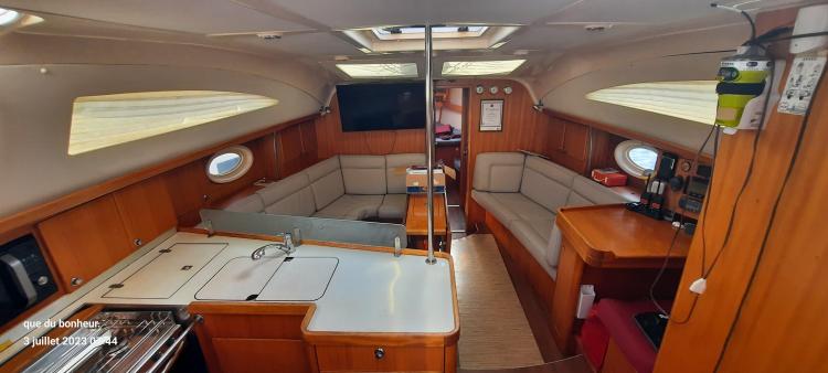 Interior of 2007 Elan Impression 434 yacht with cozy seating and modern amenities.
