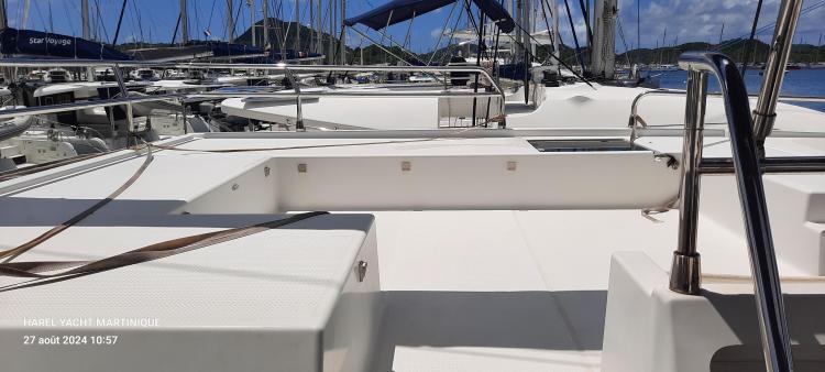 Deck view of 2017 Fountaine Pajot SABA 50 yacht in marina setting.