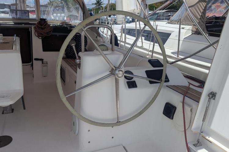 2017 Dufour 460 Grand Large yacht cockpit with steering wheel and navigation equipment.