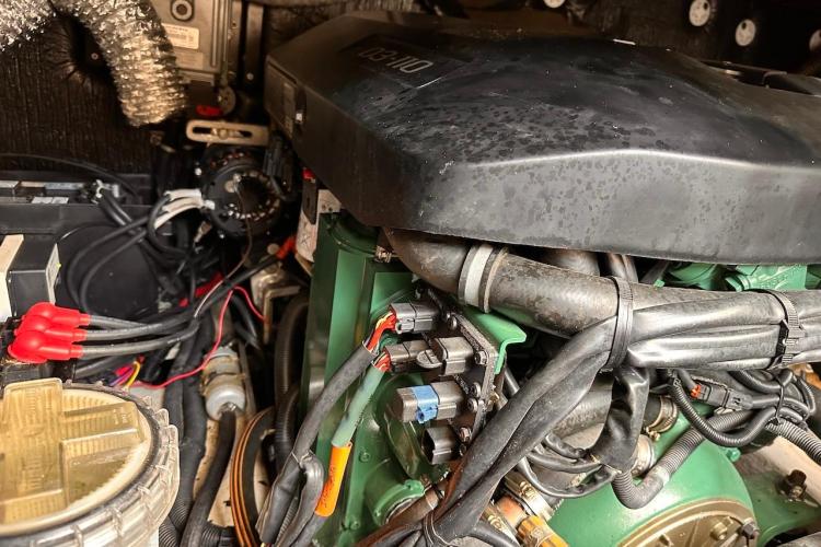 Engine compartment of a 2016 Fountaine Pajot Ipanema 58 catamaran, showcasing wiring and components.