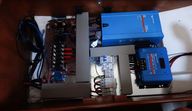 Electrical system components inside a 2005 Beneteau Cyclades 43.3 yacht.