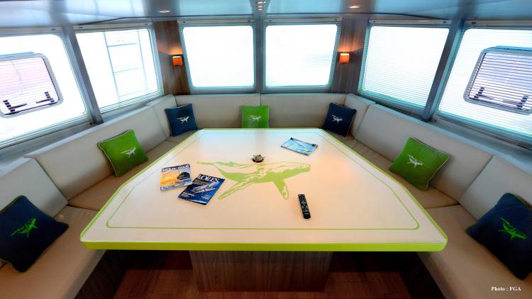 Luxurious Squalt Marine CK 64 yacht interior with modern seating and decorative pillows, 2019 model.