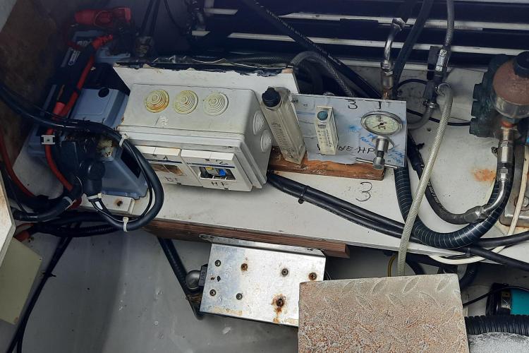 Engine compartment of 2017 Fountaine Pajot SABA 50 with control panel and wiring.