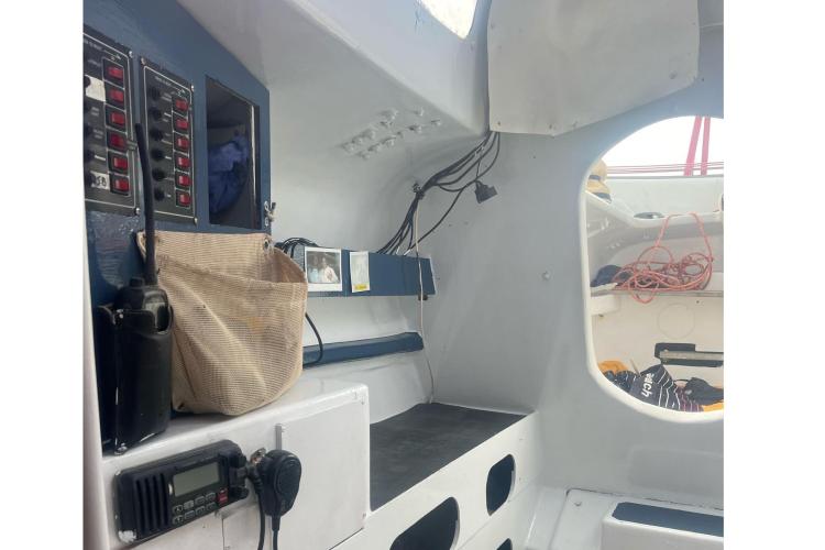 Interior of a 1994 Coulombel Trimaran with control panels and storage.