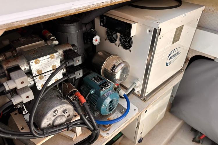 Engine room of 2016 Fountaine Pajot Ipanema 58 yacht, showcasing mechanical components.