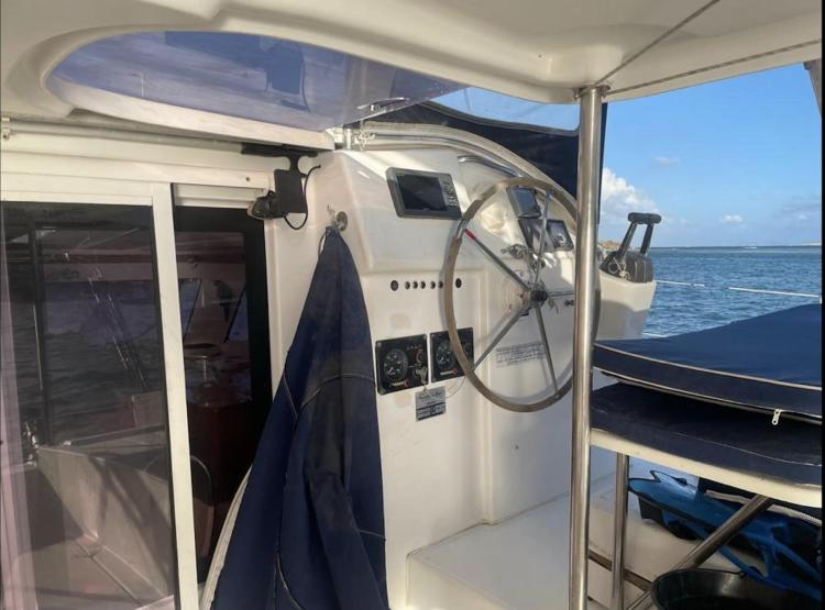 2009 Fountaine Pajot Orana 44 yacht helm with ocean view in background.