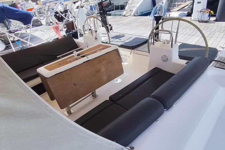 Cockpit of 2017 Dufour 460 Grand Large yacht with seating and steering wheel.
